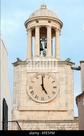 Bell tower in small medieval whitewashed town Locorotondo, Puglia (Apulia), Bari region, Italy Stock Photo