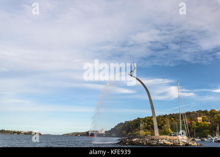 Fountain and statue of God the Father on a rainbow, Nacka Strand, Stockholm archipelago, Sweden Stock Photo