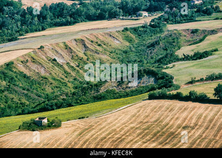 Rural landscape at summer along the road from Fossombrone to Jesi (Marches, Italy), near Sorbolongo Stock Photo