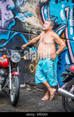 Comuna 13, located in the west of Medellin, was for many years considered one of the city's most dangerous neighborhoods. Stock Photo
