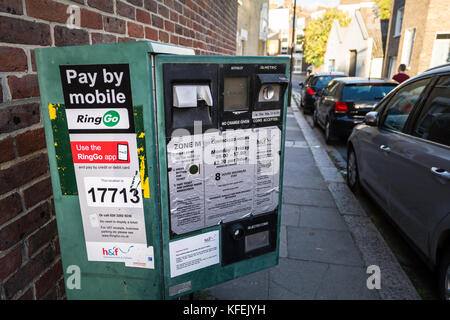 A vandalised Ringo parking meter in the LOndon Borough of Hammersmith and Fulham, UK. Stock Photo