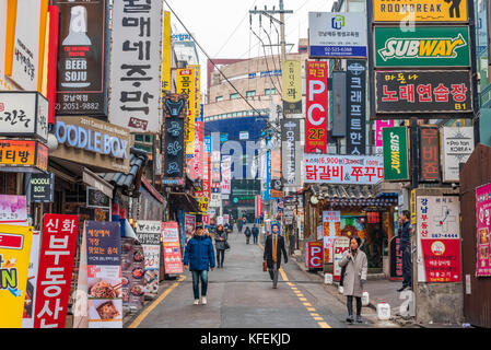 SEOUL, SOUTH KORE - JANUARY 2, 2017 - People walking along a street near the district of Gangnam in Seoul Stock Photo