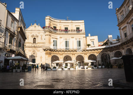 Martina Franca, Italy - August 19, 2017: Bar and tourists in Saint Mary Square in Martina Franca Stock Photo