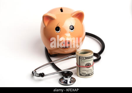 Cute Piggy Bank With Black Stethoscope and Dollar Banknotes Roll Isolated on White Background Stock Photo