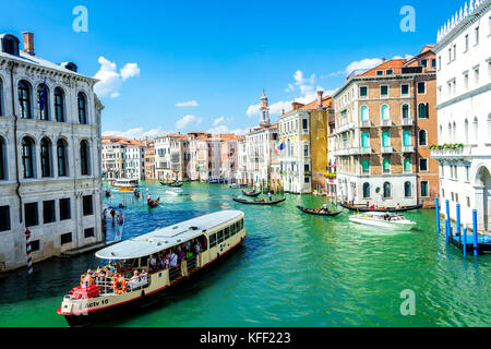 A Vaporetto and Gondolas on the Grand Canal in Venice, Italy Stock Photo