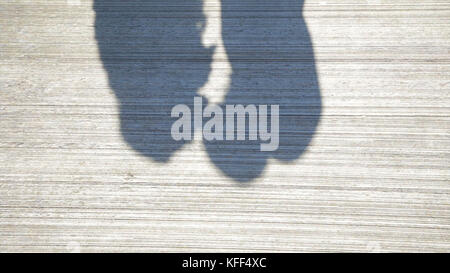 Couple Kissing Shadow. Shadows of Lover Bride and Groom on white wall. Couple Kissing Shadow Stock Photo