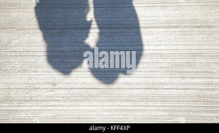 Couple Kissing Shadow. Shadows of Lover Bride and Groom on white wall. Couple Kissing Shadow Stock Photo