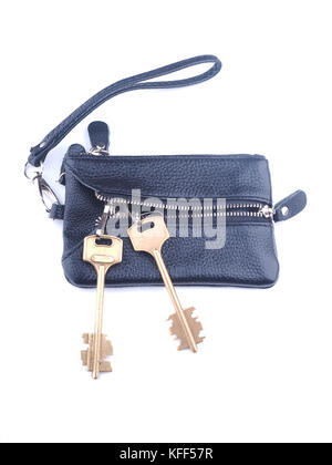 black purse with keys on a white background Stock Photo
