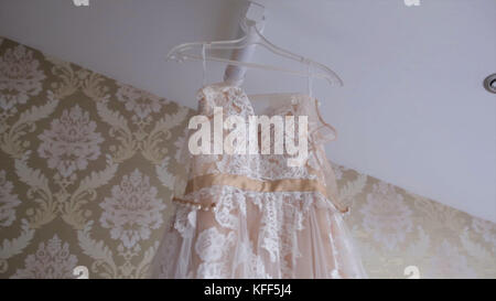 ivory lace dress pastel tone for girl. Beautiful white weddding dress ready for bride. Amazing wedding dress Stock Photo