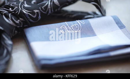 Fragment of a men's shirt with a tie on floor. men's tie and handkerchief. Men's suits dress accessories pocket towel solid color scarf handkerchief Stock Photo