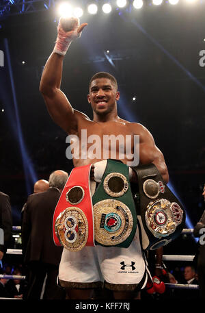 Anthony Joshua celebrates victory over Carlos Takam during the IBF World Heavyweight Title, IBO World Heavyweight Title and WBA Super World Heavyweight Title bout at the Principality Stadium, Cardiff. Stock Photo