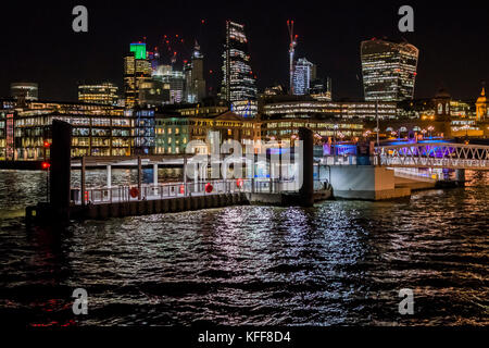 London, UK. 27th Oct, 2017. Bankside pier with the city behind at night. London 27 Sep 2017. Credit: Guy Bell/Alamy Live News
