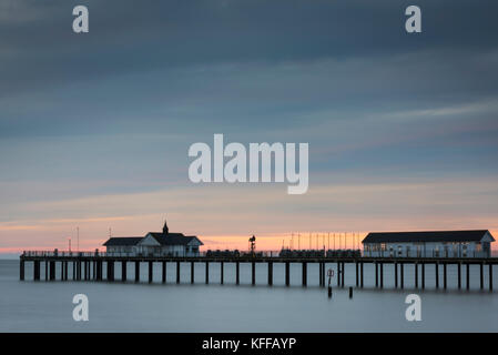 Southwold UK 28th October 2017. A cloudy and fresh start on the East Anglian coast at sunrise over the North Sea by Southwold Pier.  A chilly north west breeze has brought autumn temperatures down to around 9 degrees. Credit Julian Eales/Alamy Live News Stock Photo