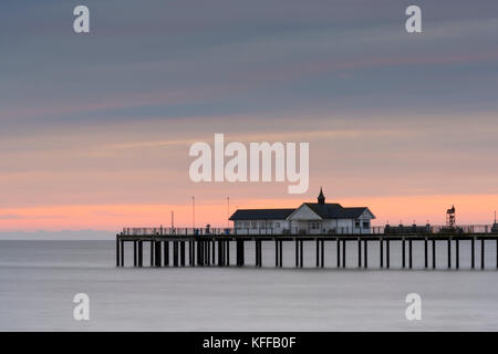 Southwold UK 28th October 2017. A cloudy and fresh start on the East Anglian coast at sunrise over the North Sea by Southwold Pier.  A chilly north west breeze has brought autumn temperatures down to around 9 degrees. Credit Julian Eales/Alamy Live News Stock Photo