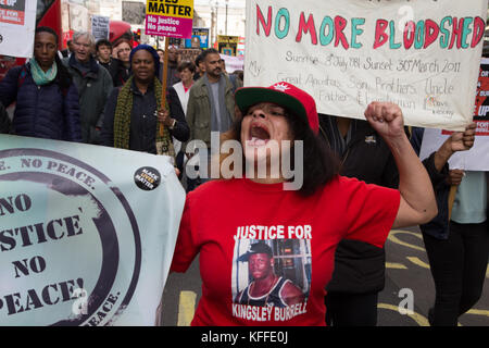 London, UK. 28th Oct, 2017. LONDON, UK 28thOctober 2017 Protesters hold placards and chant during a demonstration to remember those who have died in police custody. Credit: Thabo Jaiyesimi/Alamy Live News Stock Photo