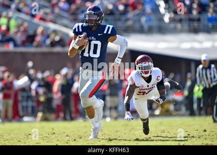 Oxford, MS, USA. 28th Oct, 2017. Mississippi quarterback Jordan Ta'amu (10) outruns an Arkansas Razorbacks defender on his way to the end zone during the first quarter of a NCAA college football game on October 28, 2017, at Vaught-Hemmingway Stadium in Oxford, MS. Arkansas won 38-37. Austin McAfee/CSM/Alamy Live News Stock Photo