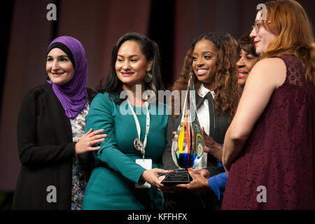 Detroit, Michigan, USA. 28th Oct, 2017. (L-R) Linda Sarsour, Carmen Perez, Tamika Mallory, Congresswoman Maxine Waters, and Bob Bland pose for a photo at the end of the Sojourner Truth Lunch during the Women’s Convention held at the Cobo Center, Detroit Michigan, Saturday, October 28, 2017 Credit: Theresa Scarbrough/Alamy Live News Stock Photo