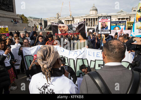 London, UK. 28th October, 2017. French campaigners speak to family members from other campaigns before the United Families and Friends Campaign (UFFC) procession in remembrance of family members and friends who died in police custody, prison, immigration detention or secure psychiatric hospitals. UFFC was set up in 1997 by families who had lost loved ones at the hands of the state with the intention of challenging systemic injustice. Credit: Mark Kerrison/Alamy Live News Stock Photo