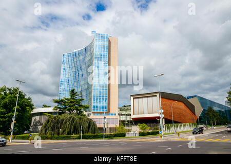 United Nations square with the World Intellectual Property Organization headquarters under a cloudy sky. Geneva, Switzerland. Stock Photo