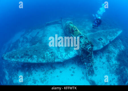 Wreck of a airplane Stuka, from the 2nd world war and scuba diver, Adriatic Sea, Mediterranean Sea, South of Island Zirja, Dalmatia, Croatia Stock Photo