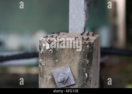 the top of the electric pole as the old power transmission system. See the rebar embedded in concrete. Stock Photo