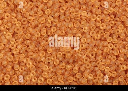 Orange seed beads. Stock Photo
