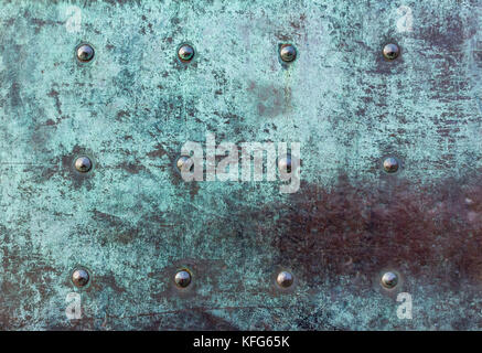 old vintage heavy iron door close up texture with patina and corrosion. backgrounds and .texture background textures surface. background wallpaper, Stock Photo