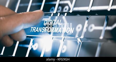 Finger pressing a digital button with the text digital transformation. Concept of digitalization of business processes. Composite between a photograph Stock Photo