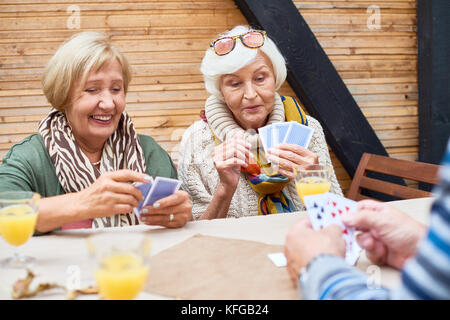 Wrapped up in Playing Poker Stock Photo