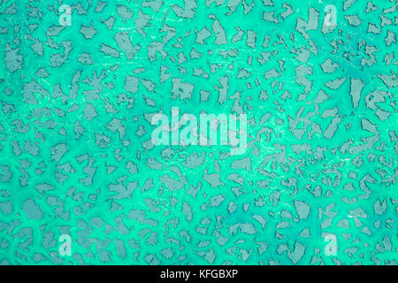 Green peeling paint on the metal surface texture background Stock Photo