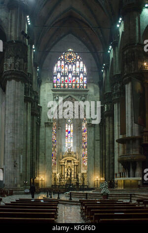 MILAN, ITALY - MAY 11 2014: Duomo Catheral in Milan, interiors of the liturgic area with benches and the altar, no people Stock Photo