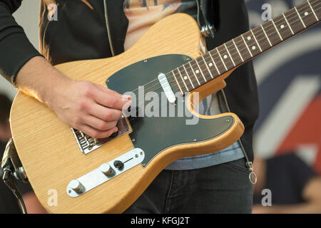 Man playing electric guitar Stock Photo