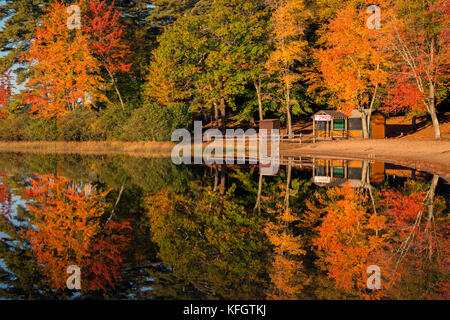 Fall foliage at Kingston State Park in Kingston, New Hampshire, Rockingham County, in October, during the off-season Stock Photo