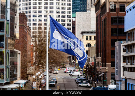 WA14037-00...WASHINGTON - The Seahawk football team flag at Century Link Field in Seattle, part of the stadium distric. Stock Photo