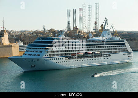 Cruise ship MS Nautica which is sailing out of Malta's Grand Harbour. owned & operated by Oceania Cruises, she is part of their Regatta Class. Malta Stock Photo