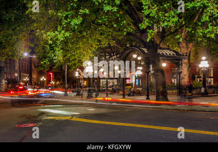 WA14169-00...WASHINGTON - Seattles Pioneer Square Pergola at night viewed from the corner of James Street and Yesler Street. Stock Photo
