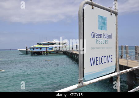 A Cairns ferry discharges tourists at the wharf at the resort of Green Island on the Great barrier reef in northern Queensland, Australia Stock Photo