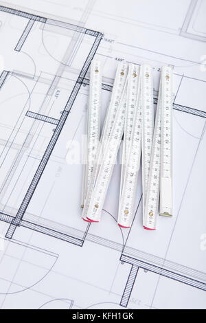 Closeup photo of folding ruler on blueprint Stock Photo
