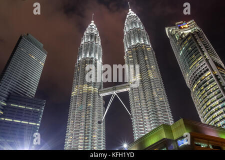 Night view to Petronas twin towers and surronding skyscrapers, CBD of Kuala Lumpur, Malasya Stock Photo