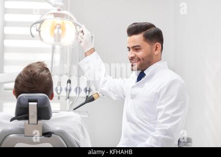 Professional dentist at his clinic Stock Photo