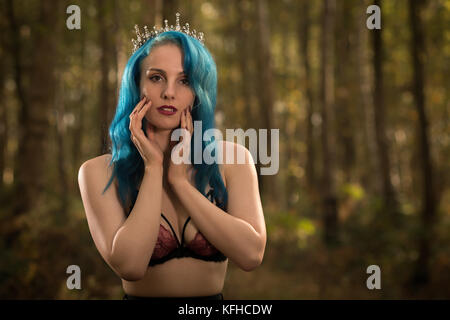 beautiful female breasts in a blue bra Stock Photo - Alamy