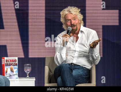 New York, USA, 28 October, 2017.  British entrepreneur Sir Richard Branson gestures as he talks during a Questions and Answers session at the 'Synergy Global Forum- A Masterclass in Disruption' in the Madison Square Garden.   Photo by Enrique Shore/Alamy Live News Stock Photo
