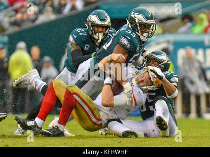 San Francisco 49ers vs. Philadelphia Eagles. Fans support on NFL Game.  Silhouette of supporters, big screen with two rivals in background Stock  Photo - Alamy