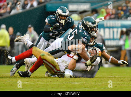 San Francisco 49ers vs. Philadelphia Eagles. Fans support on NFL Game.  Silhouette of supporters, big screen with two rivals in background Stock  Photo - Alamy