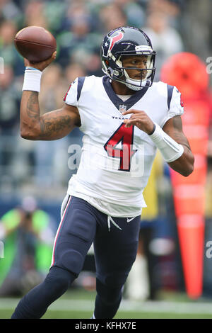 Seattle, Washington, USA. 29th Oct, 2017. October 29, 2017: Houston Texans quarterback Deshaun Watson (4) rolls out and looks to pass during a game between the Houston Texans and the Seattle Seahawks at CenturyLink Field in Seattle, WA on October 29, 2017. Sean Brown/CSM Credit: Cal Sport Media/Alamy Live News Stock Photo