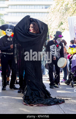 San Antonio, Texas, USA. 29th Oct, 2017. Costumed dancers perform at a San Antonio Texas Day of the Dead, Dia de los Muertos, Celebration. The Day of the Dead is a traditional Mexican holiday celebrated with altars and offerings in Mexico and elsewhere to honor family, friends, and others who have died. Credit: Michael Silver/Alamy Live News Stock Photo