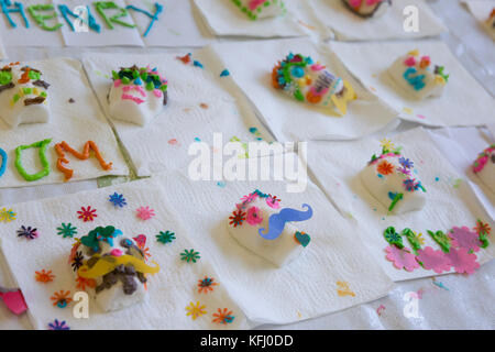 Seattle, United States. 29th Oct, 2017. Seattle, Washington: Rows of sugar skulls at a workshop during the Día de Muertos Festival at the Seattle Center Armory. The celebration is in remembrance for friends and family members who have died and to help support their spiritual journey. Credit: Paul Christian Gordon/Alamy Live News Stock Photo