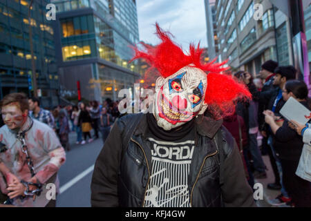 Montreal, Canada - October 28, 2017: Scary clown taking part in the Zombie Walk in Montreal Downtown Stock Photo