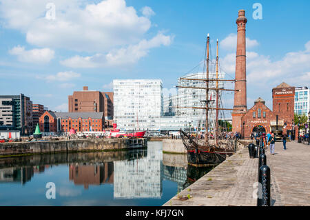 The Canning Dock with restored historic tall ship Zebu and The Pump House public house in Liverpools restored docklands. Stock Photo