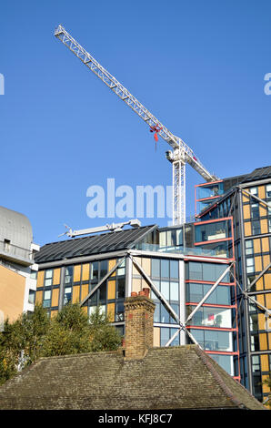 Tower crane, London, UK. Hopton Street SE1 buildings in foreground. Stock Photo